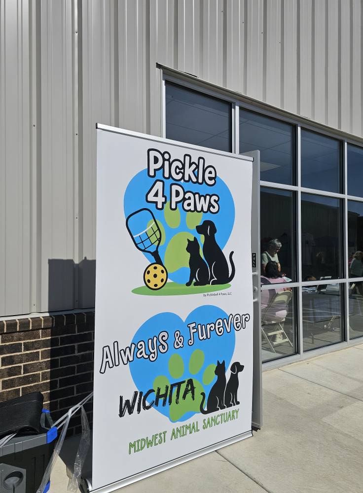 Pickle 4 Paws and Always & Furever banner at the facility