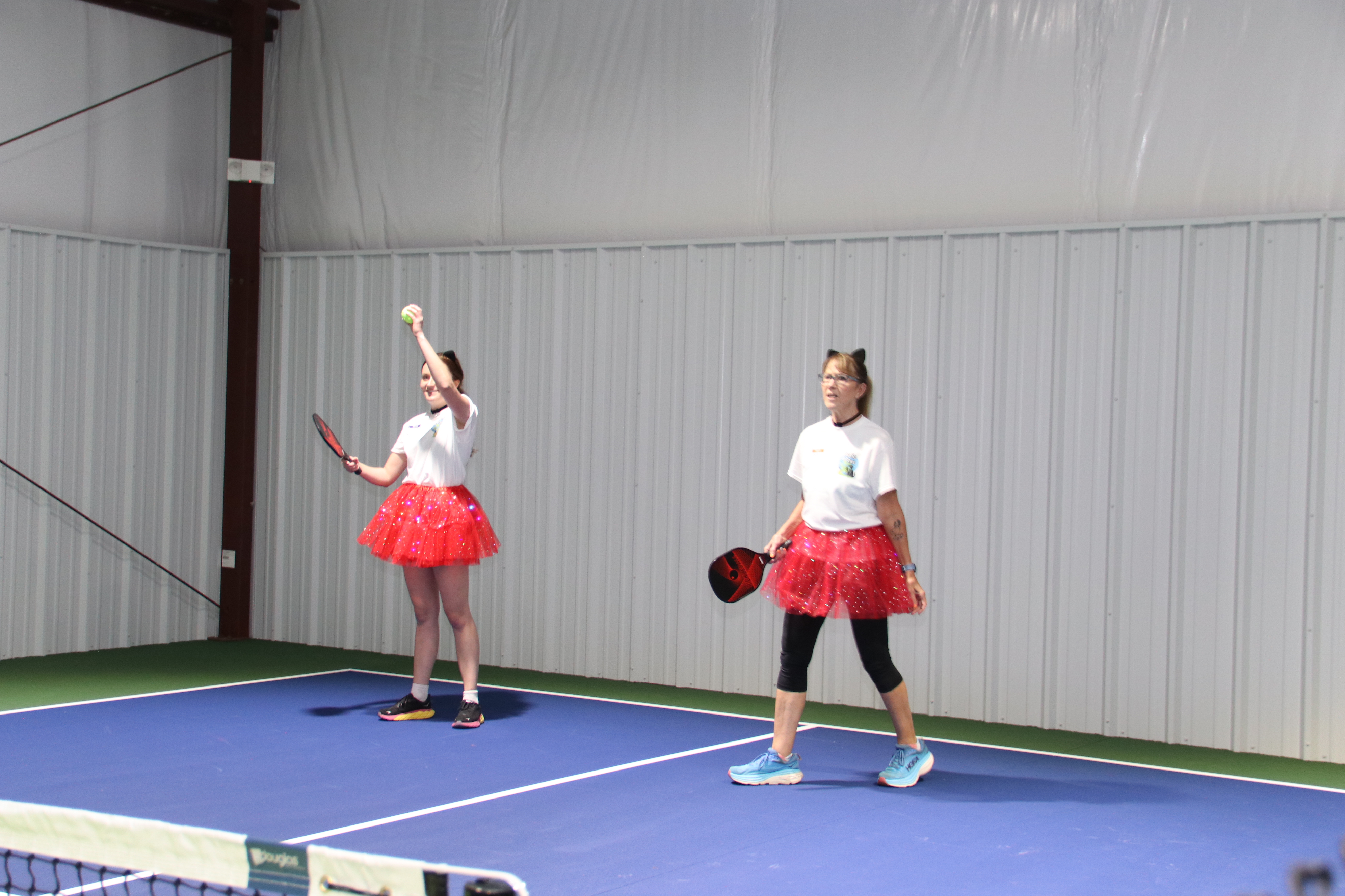 Players serving during open play